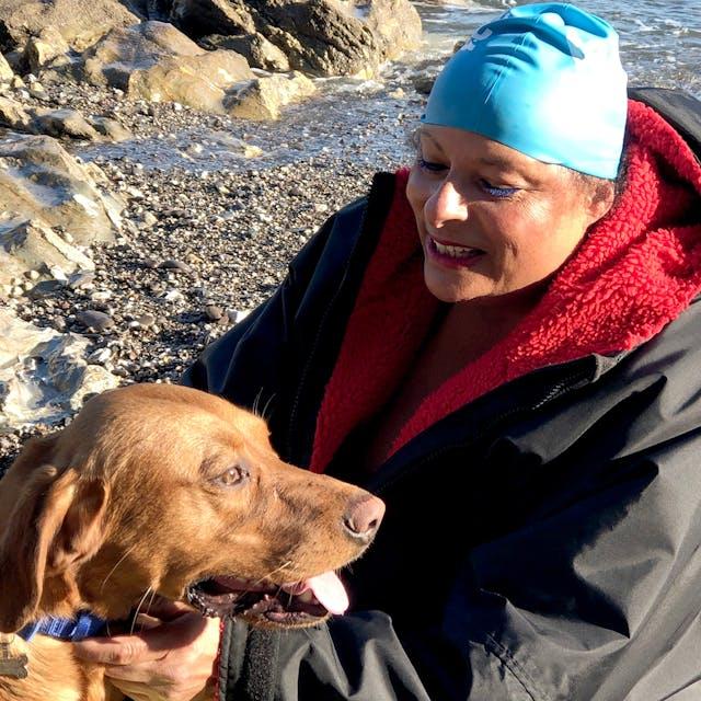 Lucy with her dog taking part in Swim22